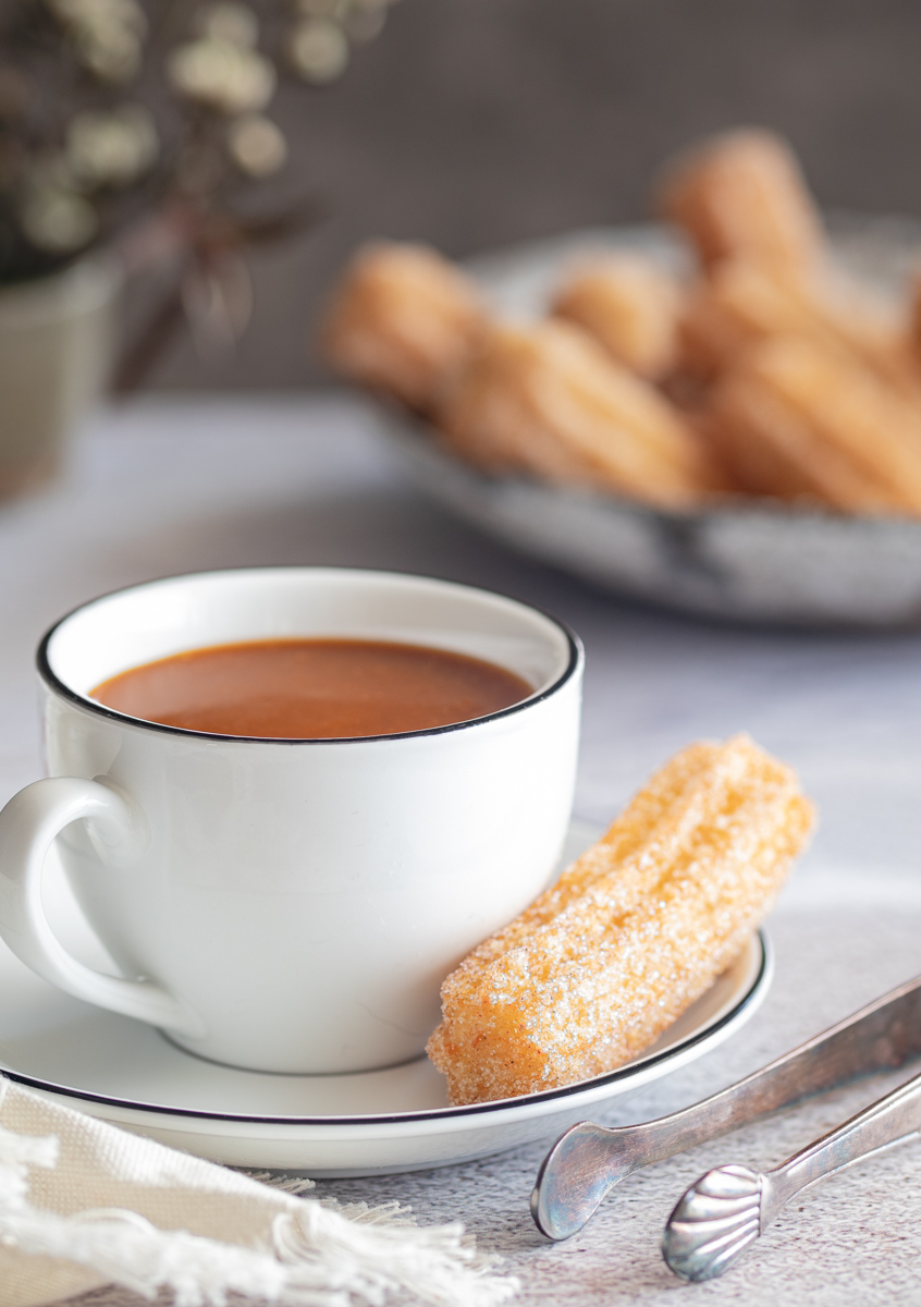 Spiced churros with white chocolate toffee sauce